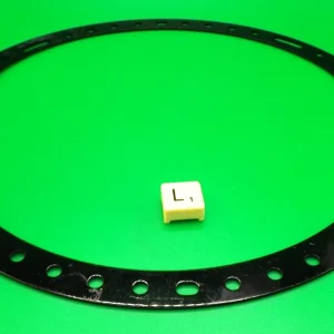Meccano Circular Strip, part 145. Black, with misaligned holes. (L)