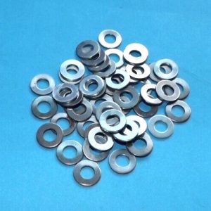 Fifty Meccano type zinc plated washers, (M4)
