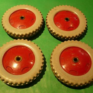 Four Meccano plastic red/grey Road Wheels, part 187
