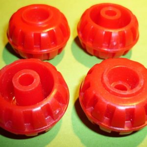 Four Meccano red plastic small Road Wheels, part 187f