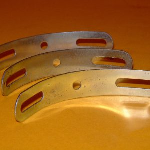 Three zinc Meccano Formed Slotted Strips, part 215