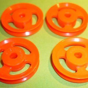 Four Meccano 1 inch tri-axle plastic pulleys, part 22BP3P, orange