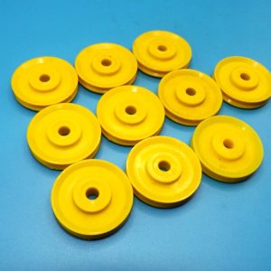 Ten Meccano 1 inch plastic pulleys without boss, Yellow, part 22ap.