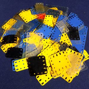 A good quantity of used Meccano plastic plates.