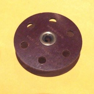 Meccano Elektrikit brown insulating bush wheel, 6 holes, part 516