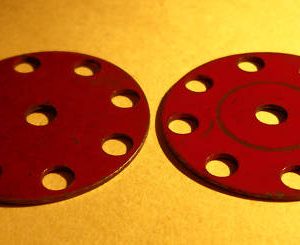 Two used red Meccano obsolete Discs, part 217a