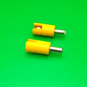Two Meccano miniature split pin plugs, yellow.