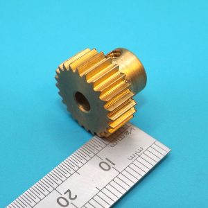 A Meccano compatible 24 tooth brass pinion, 1/4 inch face.