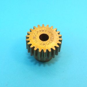 A Meccano Argentina 22 tooth brass pinion, 1/4 inch face.